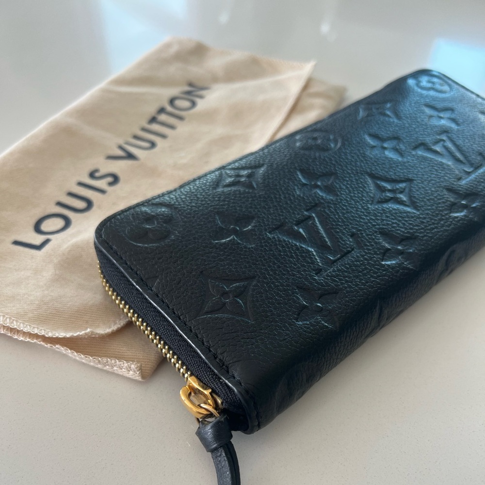 Authentic Louis Vuitton Clemence black/gold wallet. Like new. Originally $785.